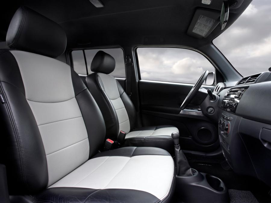  Daihatsu Materia Black Edition 2009 года  (фото 15 из 16)